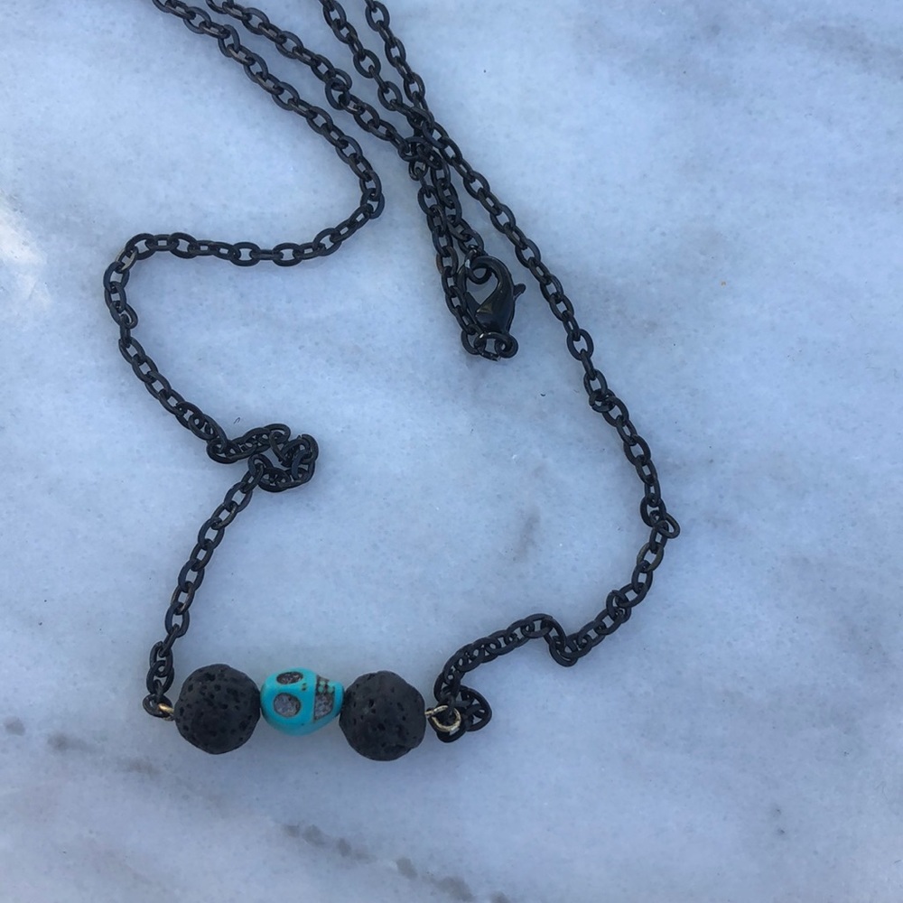 Aromatherapy teal skull volcanic bead necklace